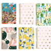 Six Bloom brand softcover, spiral ring planners. Planners come in a variety of botanical prints and abstract designs.