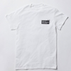 A short-sleeved white t-shirt features a printed "Toronto Metropolitan University" corporate logo on the front left chest in black.