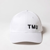 White Cap with Black TMU on lower left