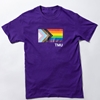 A short-sleeved purple t-shirt features the Pride Progress flag with a small TMU in white.