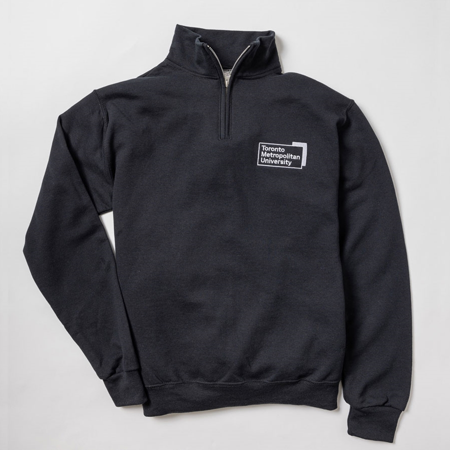 A  black quarter zip sweatshirt features a small white "Toronto Metropolitan University" university logo on the front left chest.