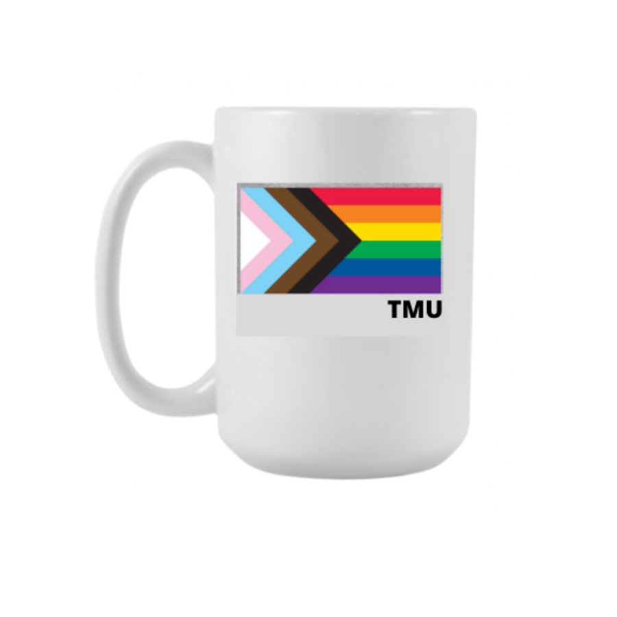 11oz ceramic mug which features the Pride Progress Flag with TMU in black.